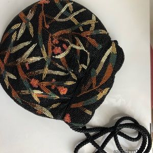 Hand beaded denim enlaided with beads